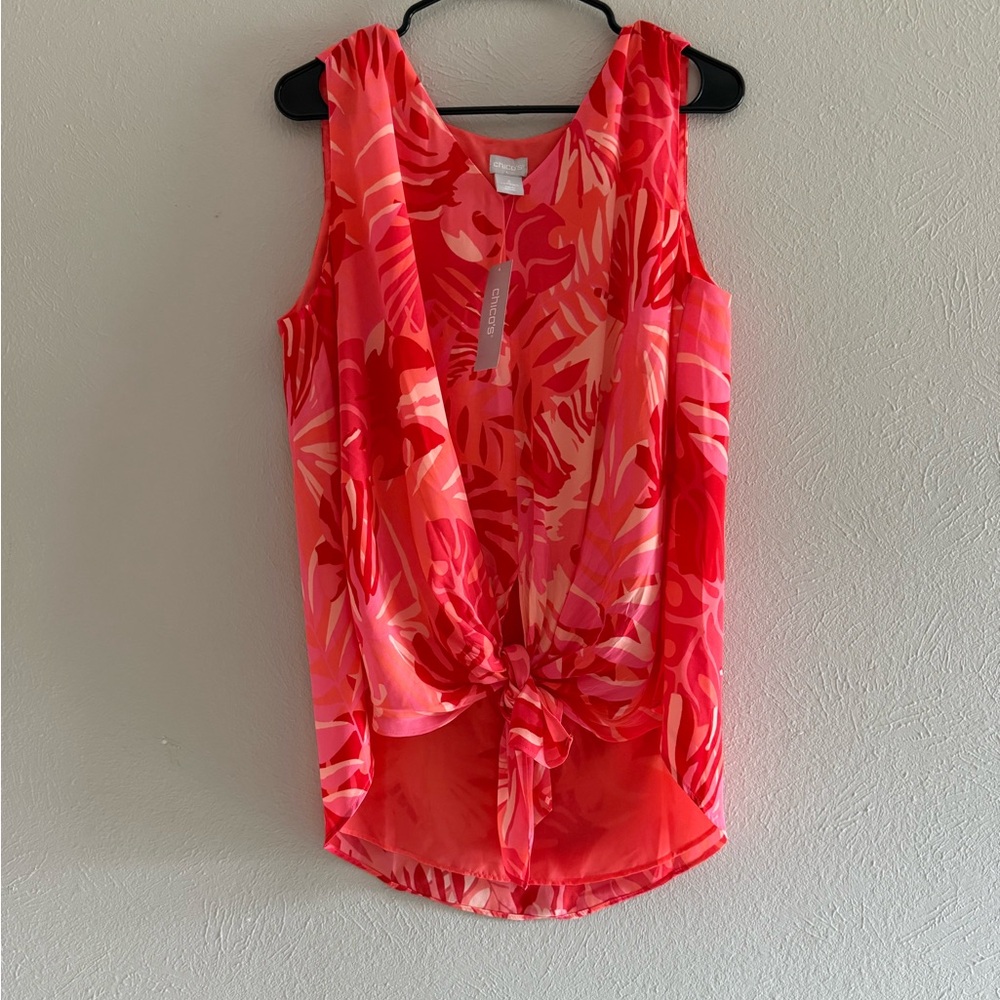 Chico's Tropical Pink Sleeveless Blouse, high/low. PTP 22”. Length 25/30”
